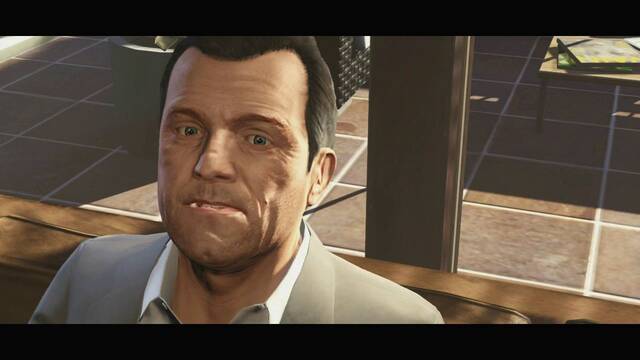 Michael en GTA V - Un primer plano del triler, mostrando el progreso en las caras del juego.