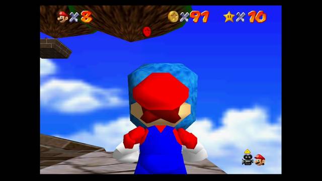 Super Mario 64 - Monedas rojas en Whomp's Fortress - Sobre uno de los cubos aplastadores