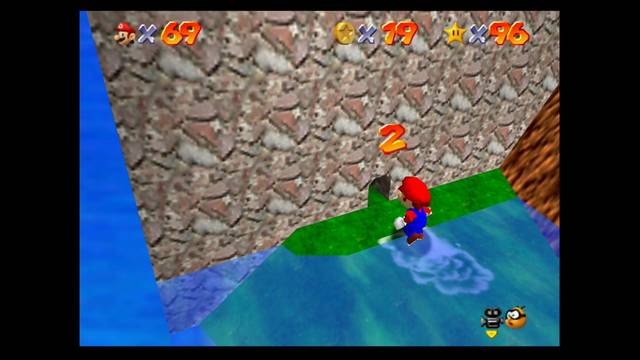Super Mario 64 - Puntos secretos en Tiny-Huge Island (estrella 4) - Punto 2 en la playa