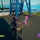Fortnite Battle Royale - Coloca micros en ubicaciones clave - Estacion al sur del Cataclismo, al pie de la torre suroeste